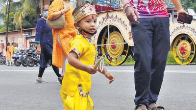On the occasion of Janmashtami on Monday, a young worshipper dressed up as a young Krishna, outside the ISKCON temple in Nigdi, which remained closed. No ‘dahi handi’ events were held in Pune. (HT) On the occasion of Janmashtami on Monday, a young worshipper dressed up as a young Krishna, outside the ISKCON temple in Nigdi, which remained closed. No ‘dahi handi’ events were held in Pune. (HT)