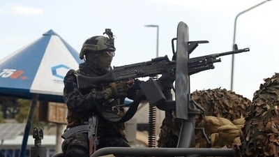 Taliban special force fighters arrive inside the Hamid Karzai International Airport after the US military's withdrawal, in Kabul. (AP)