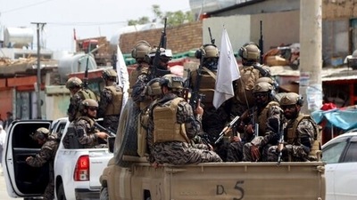 Taliban special force fighters arrive outside the Hamid Karzai International Airport after the U.S. military's withdrawal, in Kabul. (AP) Taliban special force fighters arrive outside the Hamid Karzai International Airport after the U.S. military's withdrawal, in Kabul. (AP)
