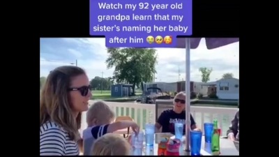 The image taken from the video shows a family sitting together. (Screengrab) The image taken from the video shows a family sitting together. (Screengrab)