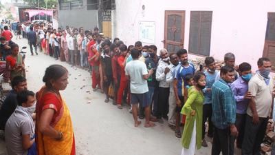 Beneficiaries not adhering to social distancing norms, wait in queues to receive Covid-19 vaccine dose at a vaccination camp, in Gurugram on August 31. (PTI) Beneficiaries not adhering to social distancing norms, wait in queues to receive Covid-19 vaccine dose at a vaccination camp, in Gurugram on August 31. (PTI)