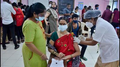A health worker administers a dose of Covid-19 vaccine to a teacher at District Nursing Collage vaccination centre in Thane on August 27. (PTI) A health worker administers a dose of Covid-19 vaccine to a teacher at District Nursing Collage vaccination centre in Thane on August 27. (PTI)