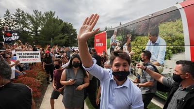 Canada's Prime Minister Justin Trudeau waves to the crowd during his election campaign tour in Nobleton, Ontario on August 27, 2021. (REUTERS) Canada's Prime Minister Justin Trudeau waves to the crowd during his election campaign tour in Nobleton, Ontario on August 27, 2021. (REUTERS)