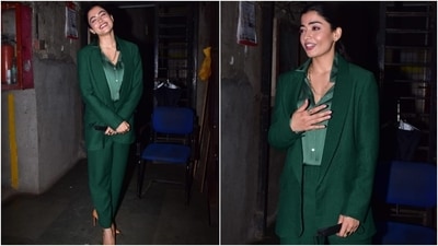 Rashmika rounded off her formal outfit with a pair of contrasting nude-coloured pointed pumps. Winger eyeliner, glowing skin, glossy pink lip shade, well-defined eyebrows and blushed cheeks completed her glam. (HT Photo/Varinder Chawla)