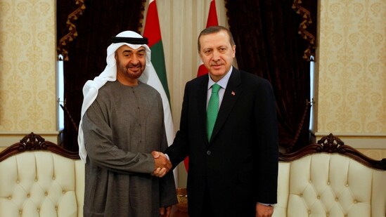 Abu Dhabi's Crown Prince Sheikh Mohammed bin Zayed Al Nahyan (L) shakes hands with Turkey's Prime Minister Recep Tayyip Erdogan in this file picture from 2012. (REUTERS)