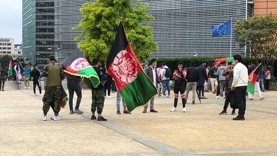 Afghans living in Brussels take part in the protest on Monday against hostile takeover of their country by the Taliban.
