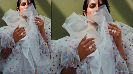 In this picture, Priyanka Chopra poses in a white puffy polka-dotted dress which she teamed with statement earrings and rings.(Instagram/@priyankachopra)