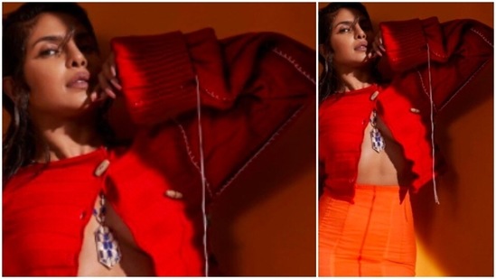 In another, Priyanka Chopra flaunts her curves in a high rise orange skirt and a red buttoned sweater.(Instagram/@priyankachopra)