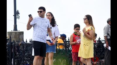 Tourists spotted without face masks on The Ridge in Shimla. Flouting of Covid norms is the major reason why cases in Himachal are consistently going up. (Deepak Sansta/HT)