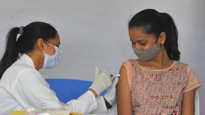 A beneficiary takes a dose of Covid vaccine at the Sukhna Lake in Chandigarh on Tuesday, August 31. (Keshav Singh/HT photo)