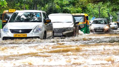 Vehicles make their way through a waterlogged road amid heavy rainfall, in New Delhi on Wednesday. (ANI) Vehicles make their way through a waterlogged road amid heavy rainfall, in New Delhi on Wednesday. (ANI)