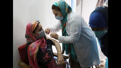 A woman receives a shot of Covid-19 vaccine during a vaccination drive in Srinagar on Wednesday. (Waseem Andrabi/HT) A woman receives a shot of Covid-19 vaccine during a vaccination drive in Srinagar on Wednesday. (Waseem Andrabi/HT)
