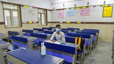 A student attends a class at Sarvodaya Bal Vidhyalaya, Rouse Avenue that reopened after further ease in Covid-19 restrictions, in New Delhi on Wednesday. (PTI) A student attends a class at Sarvodaya Bal Vidhyalaya, Rouse Avenue that reopened after further ease in Covid-19 restrictions, in New Delhi on Wednesday. (PTI)