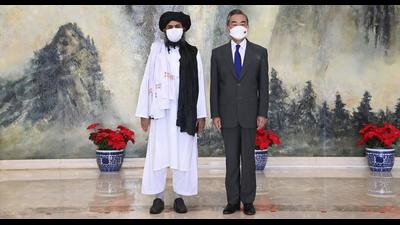 Taliban co-founder Mullah Abdul Ghani Baradar, and Chinese foreign minister Wang Yi pose for a photo during their meeting in Tianjin, China on July 28, 2021. (File photo) Taliban co-founder Mullah Abdul Ghani Baradar, and Chinese foreign minister Wang Yi pose for a photo during their meeting in Tianjin, China on July 28, 2021. (File photo)
