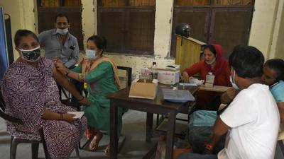 Officials said that this is the highest coverage of Covid-19 vaccinations among the 22 districts in the state, despite the uneven pace of vaccination from May 1, when slots were opened for people in the 18-45 age group. (Parveen Kumar/HT Photo) Officials said that this is the highest coverage of Covid-19 vaccinations among the 22 districts in the state, despite the uneven pace of vaccination from May 1, when slots were opened for people in the 18-45 age group. (Parveen Kumar/HT Photo)