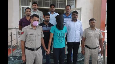 The 20-year-old accused being taken to a Rohtak court after his arrest on Wednesday. (HT Photo) The 20-year-old accused being taken to a Rohtak court after his arrest on Wednesday. (HT Photo)