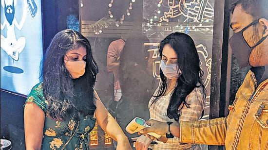 Covid norms are enforced at this pub in Koregaon park, with all guests screened before entry. (Shankar Narayan/HT PHOTO)