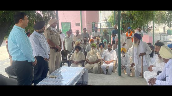 SIT members interacting with local residents at Burj Jawahar Singh Wala village in Faridkot district on Wednesday.