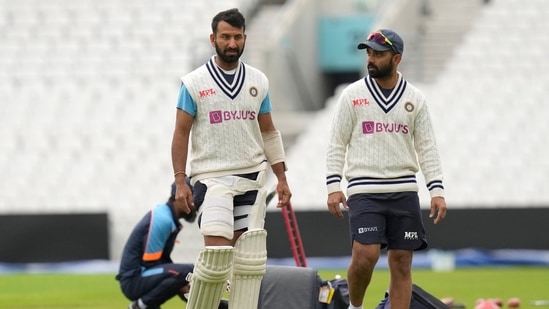 India's Cheteshwar Pujara, left, and India's Ajinkya Rahane, right, during a training session ahead of the fourth Test at The Oval(AP)