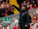 Liverpool manager Jurgen Klopp gives instructions to his players.