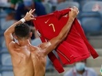 Portugal's Cristiano Ronaldo holds up his shirt as he celebrates after scoring his side's second goal during the World Cup 2022 group A qualifying match.(AP) Portugal's Cristiano Ronaldo holds up his shirt as he celebrates after scoring his side's second goal during the World Cup 2022 group A qualifying match.(AP)