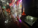 Rainfall from Hurricane Ida flood the basement of a Kennedy Fried Chicken fast food restaurant.(AFP)