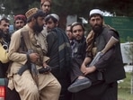 Taliban fighters at the Hamid Karzai International Airport after the US military's withdrawal, in Kabul on August 31. Taliban fighters at the Hamid Karzai International Airport after the US military's withdrawal, in Kabul on August 31.