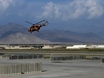 An Afghan national army helicopter takes off inside the Bagram airbase after all US and Nato troops left. An Afghan national army helicopter takes off inside the Bagram airbase after all US and Nato troops left.