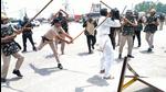 Police cane-charge a farmer at Karnal's Bastara toll plaza during a protest against the new farm laws, in Karnal, Haryana on August 28. (Manoj Dhaka / Hindustan Times) Police cane-charge a farmer at Karnal's Bastara toll plaza during a protest against the new farm laws, in Karnal, Haryana on August 28. (Manoj Dhaka / Hindustan Times)