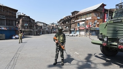 A soldier stands guard in Srinagar on Thursday. (Photo By Waseem Andrabi/Hindustan Times)