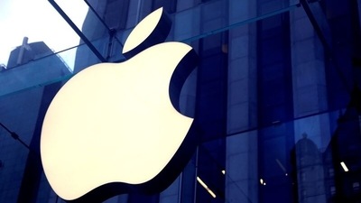 The Apple Inc logo is seen hanging at the entrance to the Apple store on 5th Avenue in Manhattan, New York, US. (REUTERS)