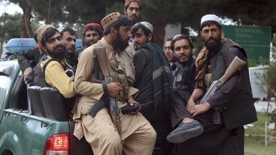 Taliban fighters at the Hamid Karzai International Airport after the US military's withdrawal, in Kabul on August 31. Taliban fighters at the Hamid Karzai International Airport after the US military's withdrawal, in Kabul on August 31.