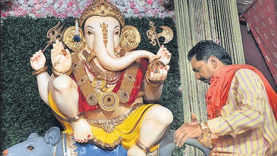 Guruji Taalim Ganpati mandal, during Ganapati festival procession on Laxmi road in Pune. (HT FILE PHOTO) Guruji Taalim Ganpati mandal, during Ganapati festival procession on Laxmi road in Pune. (HT FILE PHOTO)