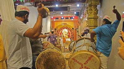 Hutatma Babu Genu Ganesh Mandal volunteers playing Dhol - Tasha inside the temple. (Ravindra Joshi/HTFile Photo)