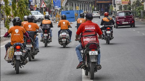 Deliverymen of food aggregators are not formal employees and are accordingly called partners, agents, executives or associates. Experts say this nomenclature that they are ineligible for several benefits, be it a monthly salary or a provident fund account. (PTI File)
