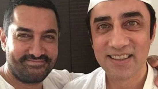 Aamir Khan poses with his brother, Faissal Khan.