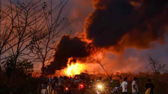 Tinsukia: The Baghjan-5 oil well blow-out on May 27 2020 was followed by an explosion that led to extensive damage and destruction of the nearby wetlands and the biodiversity of Dibru-Saikhowa National Park. (PTI) Tinsukia: The Baghjan-5 oil well blow-out on May 27 2020 was followed by an explosion that led to extensive damage and destruction of the nearby wetlands and the biodiversity of Dibru-Saikhowa National Park. (PTI)