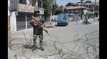 A security personnel stands guard during restrictions in Srinagar following the death of separatist leader Syed Ali Shah Geelani, on September 3. (PTI) A security personnel stands guard during restrictions in Srinagar following the death of separatist leader Syed Ali Shah Geelani, on September 3. (PTI)