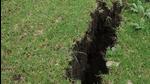 Wide cracks surfaced in the ground in Sainrathi village of Pithoragarh. (HT photo)