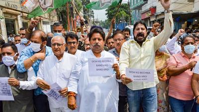 Congress workers take out a protest march against central government outside the party office in Jammu on Friday. (PTI)