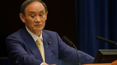 Japan's Prime Minister Yoshihide Suga, who took over after Shinzo Abe resigned last September, citing ill health, has seen his support ratings sink to below 30% as the nation struggles with its worst wave of Covid-19 infections ahead of a general election this year. (REUTERS)
