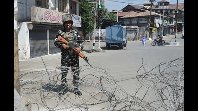 A security personnel stands guard during restrictions in Srinagar following the death of separatist leader Syed Ali Shah Geelani, on September 3. (PTI) A security personnel stands guard during restrictions in Srinagar following the death of separatist leader Syed Ali Shah Geelani, on September 3. (PTI)