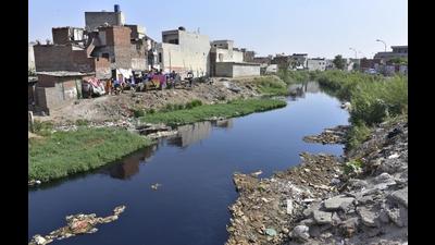 According to an MC official, residents dump garbage in the stream to avoid paying waste collection charges. (HT Photo)