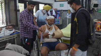 Injured Kuldeep Singh at the civil hospital in Panchkula on Friday. (SANT ARORA/HT)