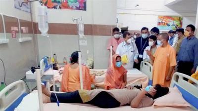 Uttar Pradesh chief minister Yogi Adityanath meets patients at a government medical college in Firozabad. (PTI) Uttar Pradesh chief minister Yogi Adityanath meets patients at a government medical college in Firozabad. (PTI)