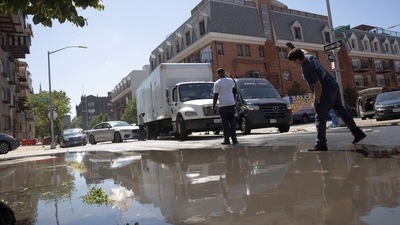 People help direct traffic around vehicles stranded in the street, after flooding caused by the remnants of Tropical Storm Ida brought drenching rain the threat of flash floods and tornadoes to parts of the northern mid-Atlantic, in the Brooklyn borough of New York City, U.S. (REUTERS)