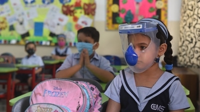 A primary school girl from Uttar Pradesh wears a full face face gear to protect herself from Covid-19. (HT Photo/Deepak Gupta) A primary school girl from Uttar Pradesh wears a full face face gear to protect herself from Covid-19. (HT Photo/Deepak Gupta)
