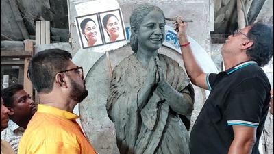 Puja organisers said that unlike the Goddess, who holds weapons in her ten hands, Mamata Banerjee’s idol would hold logos and names of various schemes launched by her government, which returned to power for the third consecutive term this May in Bengal. (Crowdnxt Media Art .) Puja organisers said that unlike the Goddess, who holds weapons in her ten hands, Mamata Banerjee’s idol would hold logos and names of various schemes launched by her government, which returned to power for the third consecutive term this May in Bengal. (Crowdnxt Media Art .)