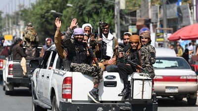 Taliban fighters patrol the streets in Kabul on Thursday. (AFP)