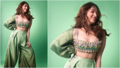 In the stills, Tamannaah Bhatia can be seen wearing a green embroidered bralette which she paired with loose trousers and one-sided sleeves. (Instagram/@ tamannaahspeaks) In the stills, Tamannaah Bhatia can be seen wearing a green embroidered bralette which she paired with loose trousers and one-sided sleeves. (Instagram/@ tamannaahspeaks)